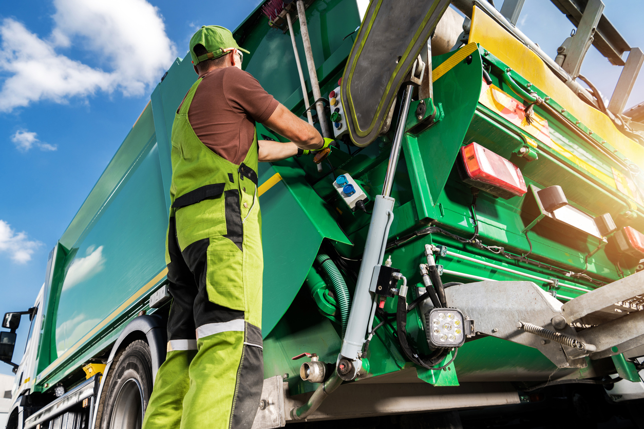 Garbage Truck and Waste Collector Worker